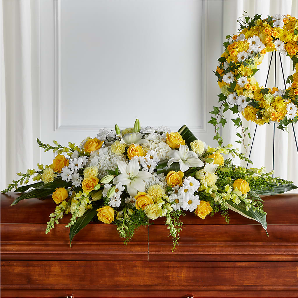 Golden Harmony Casket Spray – KLEIN'S FLORAL & GREENHOUSES INC, Madison WI